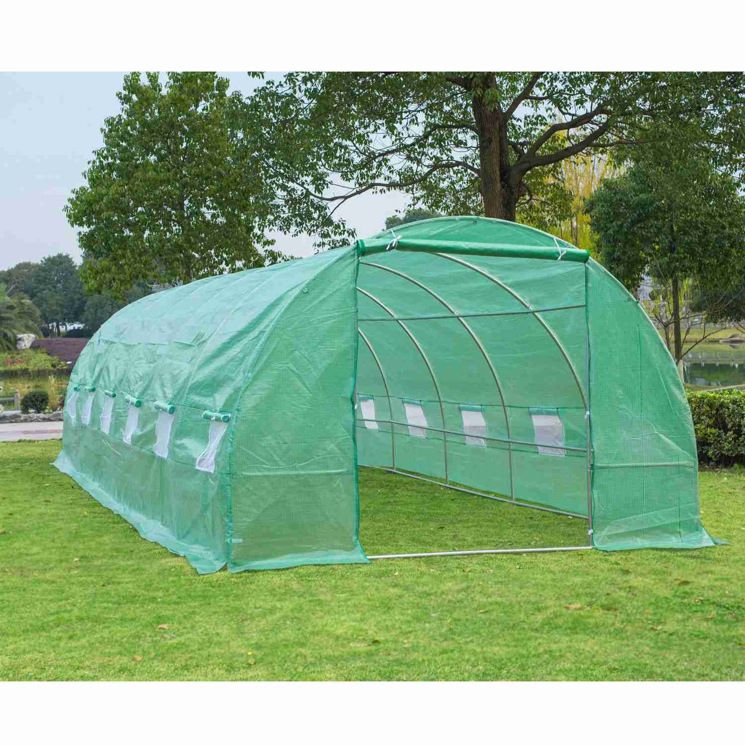 Green mesh shade tunnel on a lawn, a cover that cools and does not seal the crop