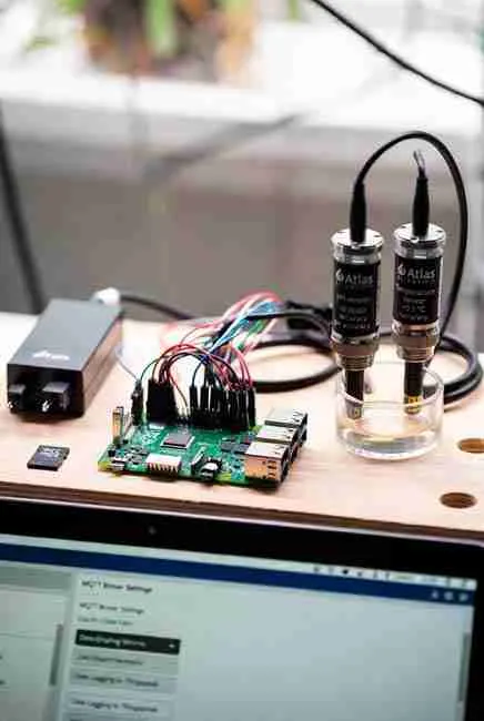 An image of Parts list: Pi board, microSD card (16GB+), power supply, sensors.
Flash Raspberry Pi OS, install MQTT broker for device comms.