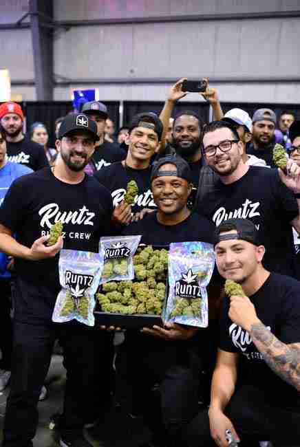 Runtz Crew at 2017 Emerald Cup in Santa Rosa with Yung LB holding frosty Runtz Cannabis buds and bright mylar packaging